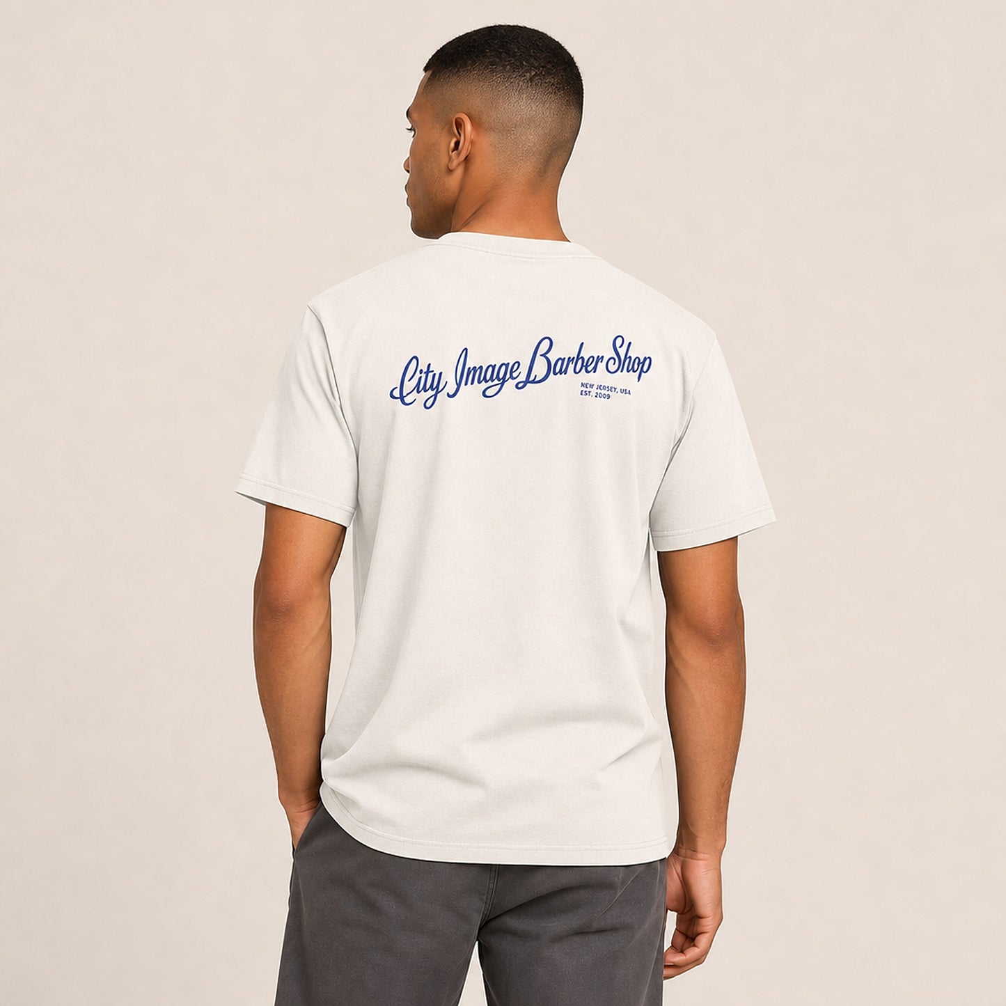 City Image Script Oversized Tee (Faded Bone) on model