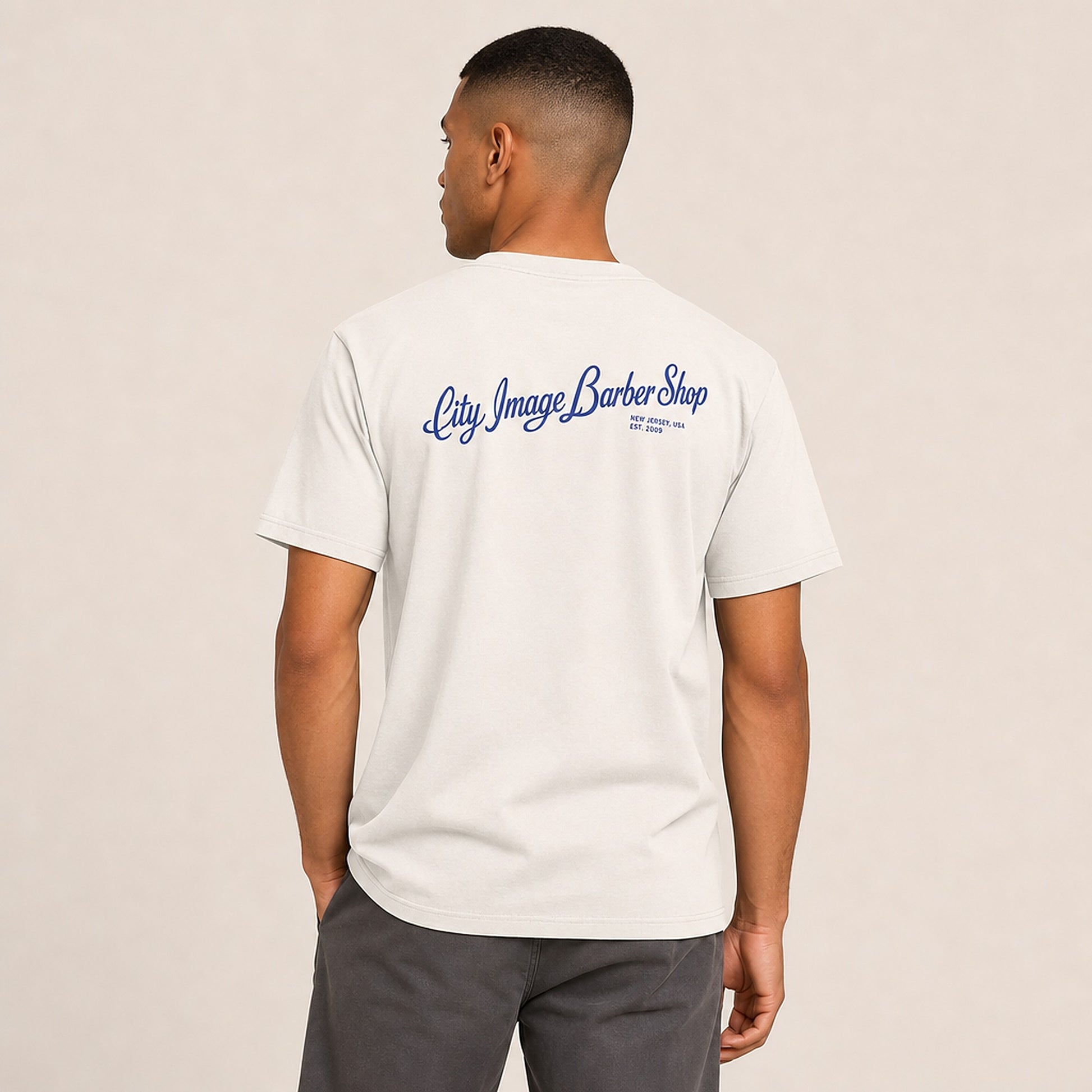 City Image Script Oversized Tee (Faded Bone) on model